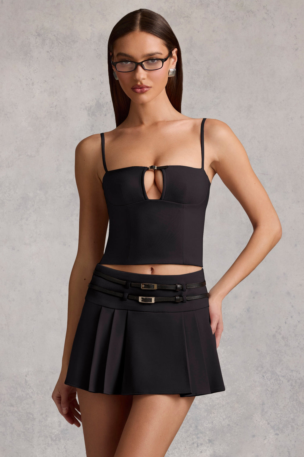 Belted Low-Rise Pleated Mini Skirt in Black