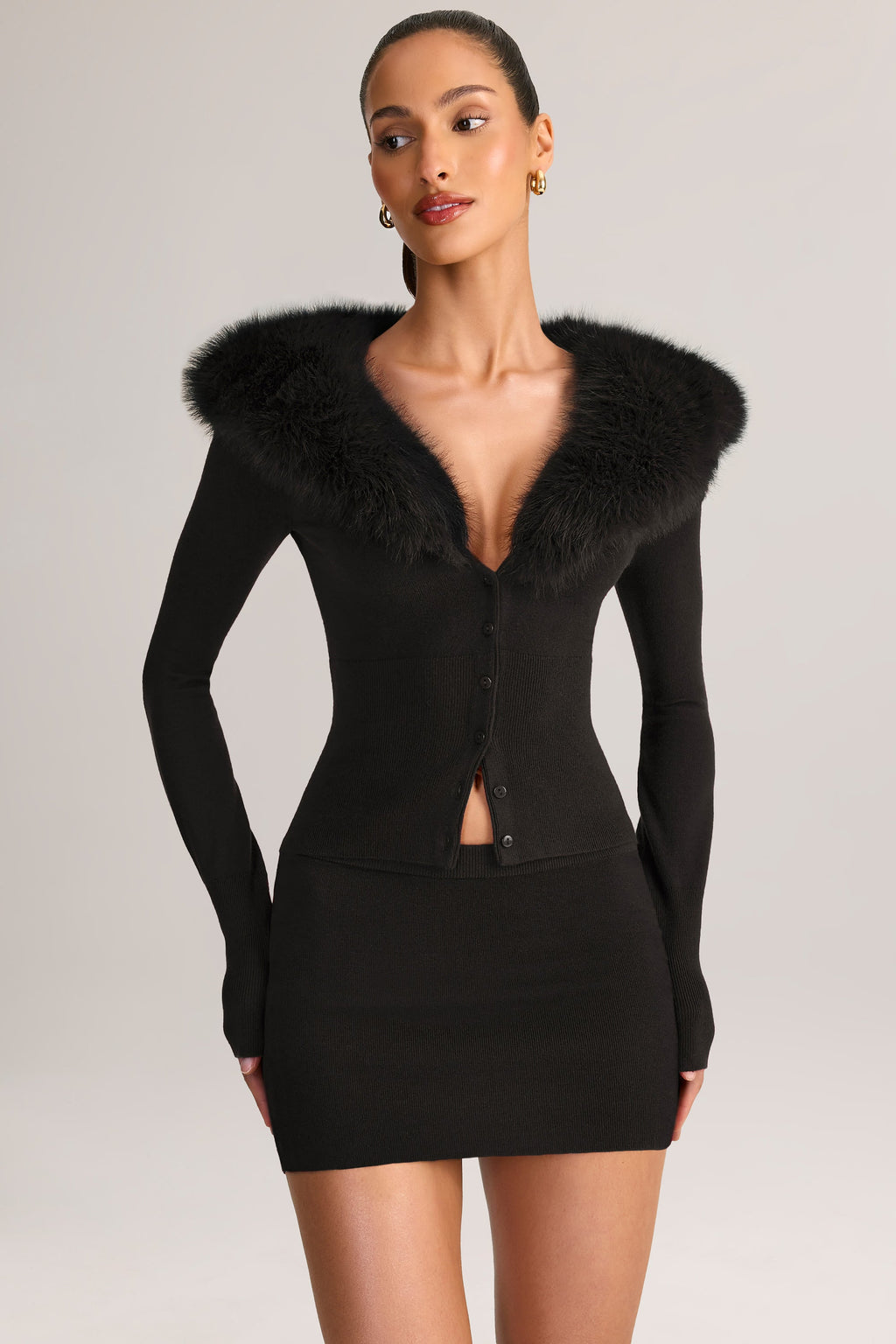 Knit Mid-Rise Mini Skirt in Black