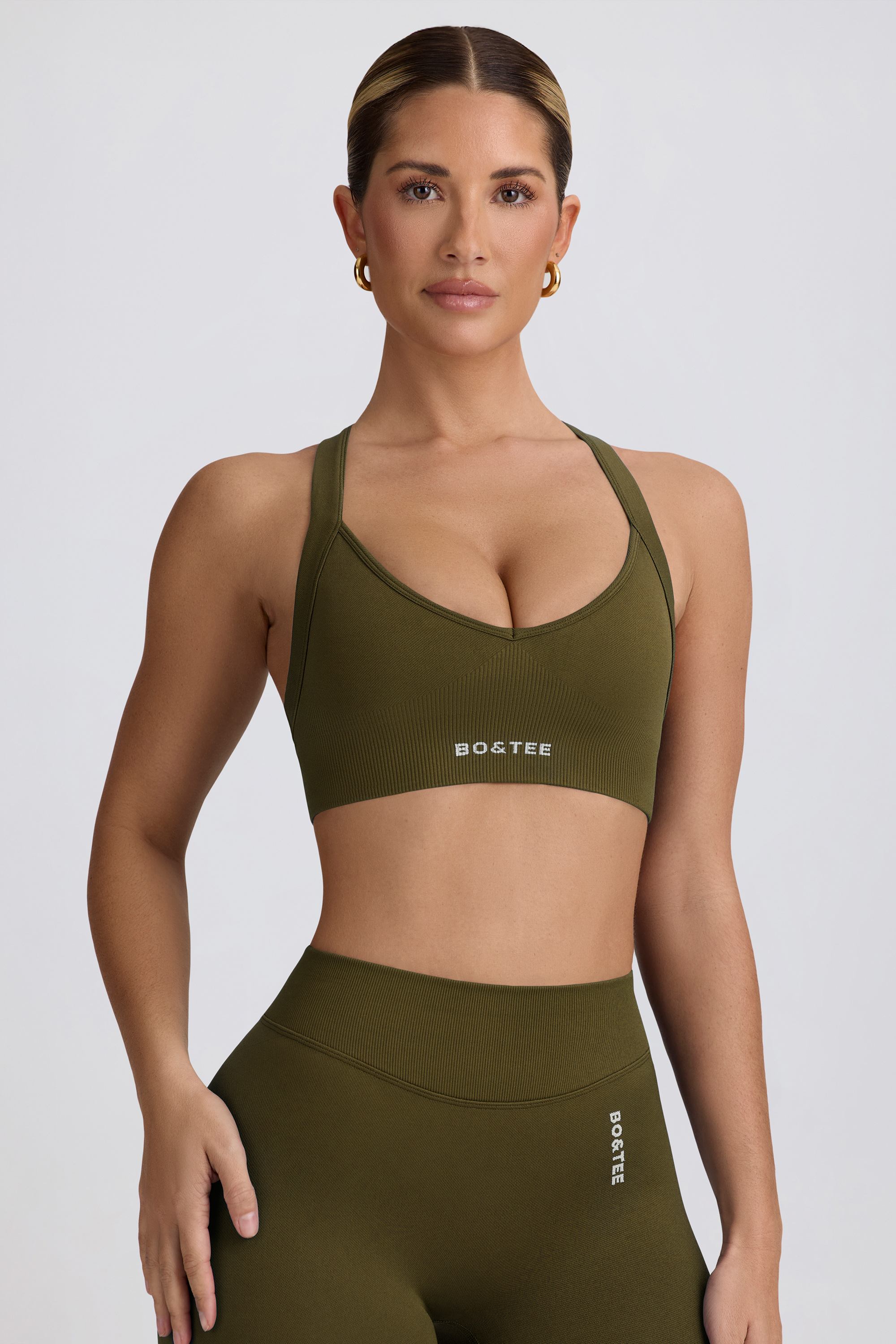 Super Sculpt Seamless Cross-Back Sports Bra in Dark Green