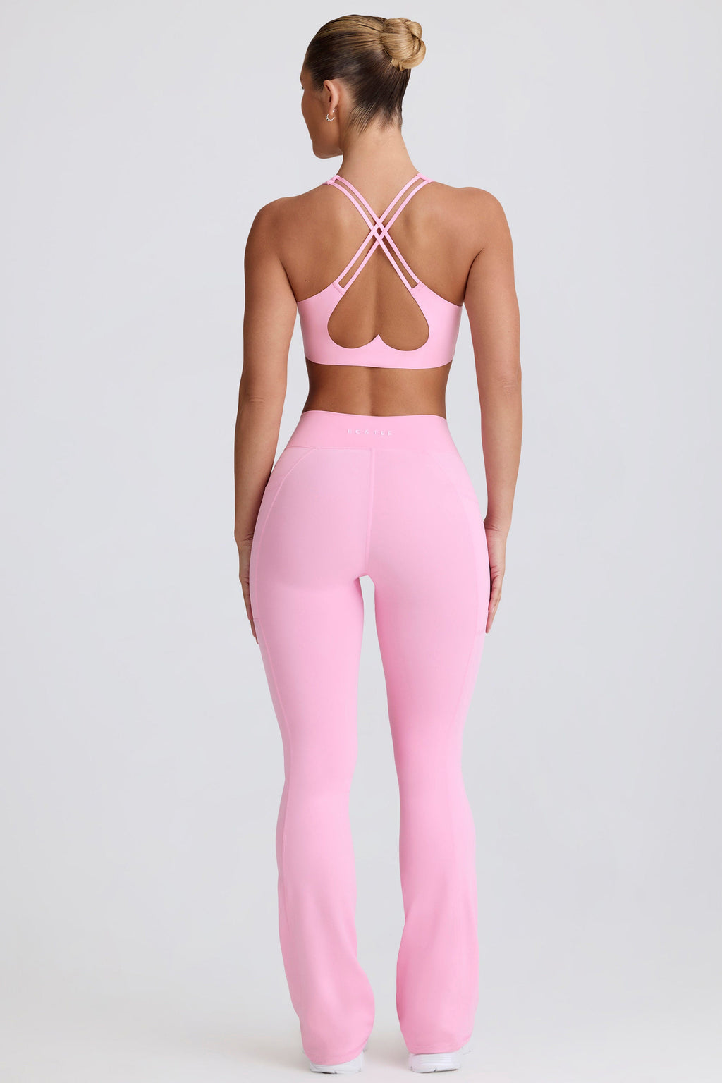 Soft Active V-Waist Pocket Flared Leggings in Baby Pink