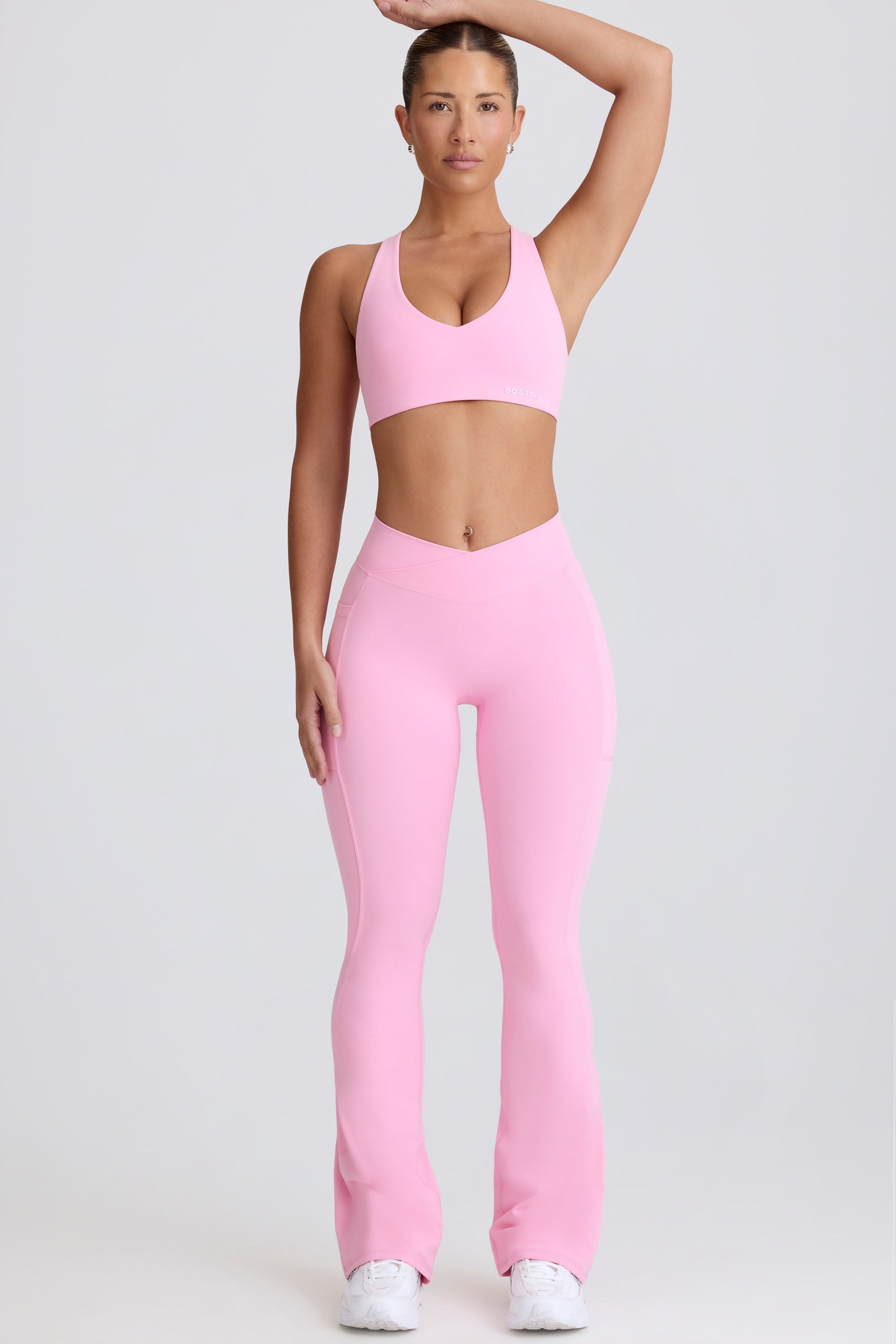 Soft Active V-Waist Pocket Flared Leggings in Baby Pink
