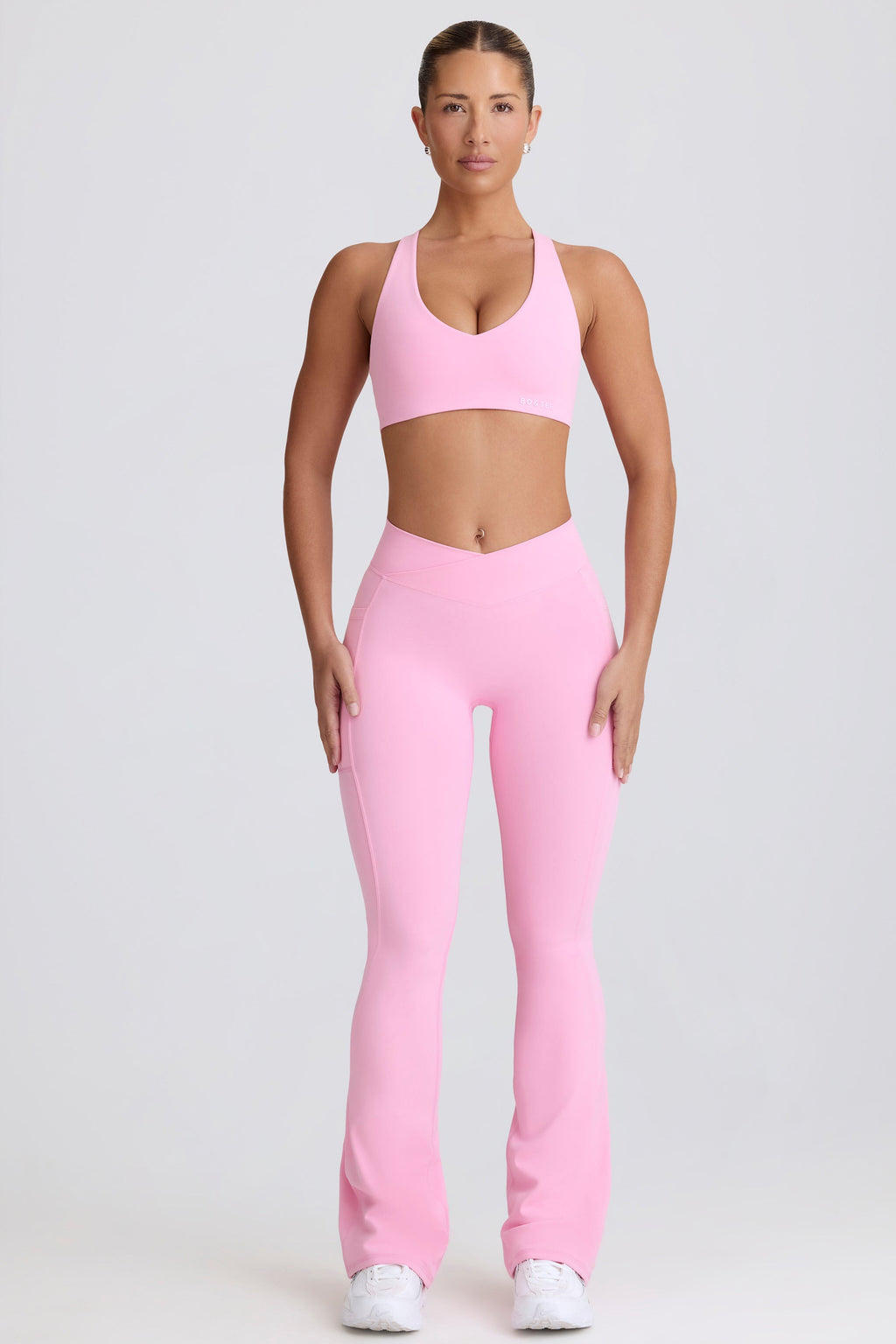 Soft Active V-Waist Pocket Flared Leggings in Baby Pink