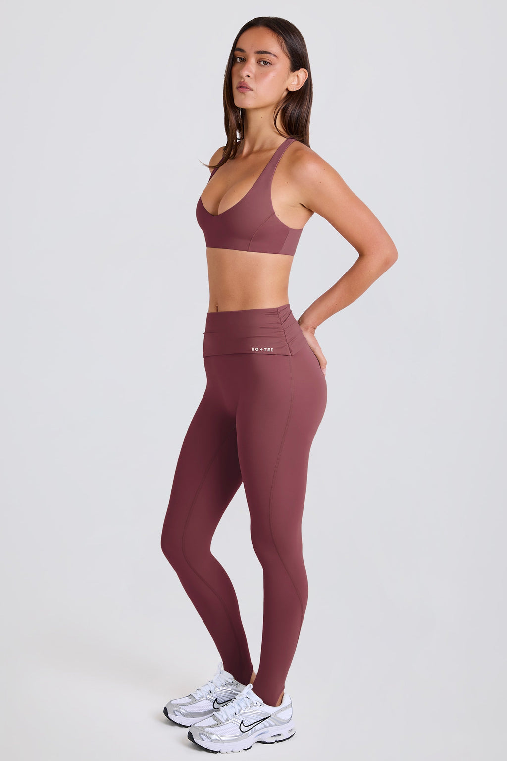 Four-Way Stretch Foldover Mid-Rise Stirrup Leggings in Acai