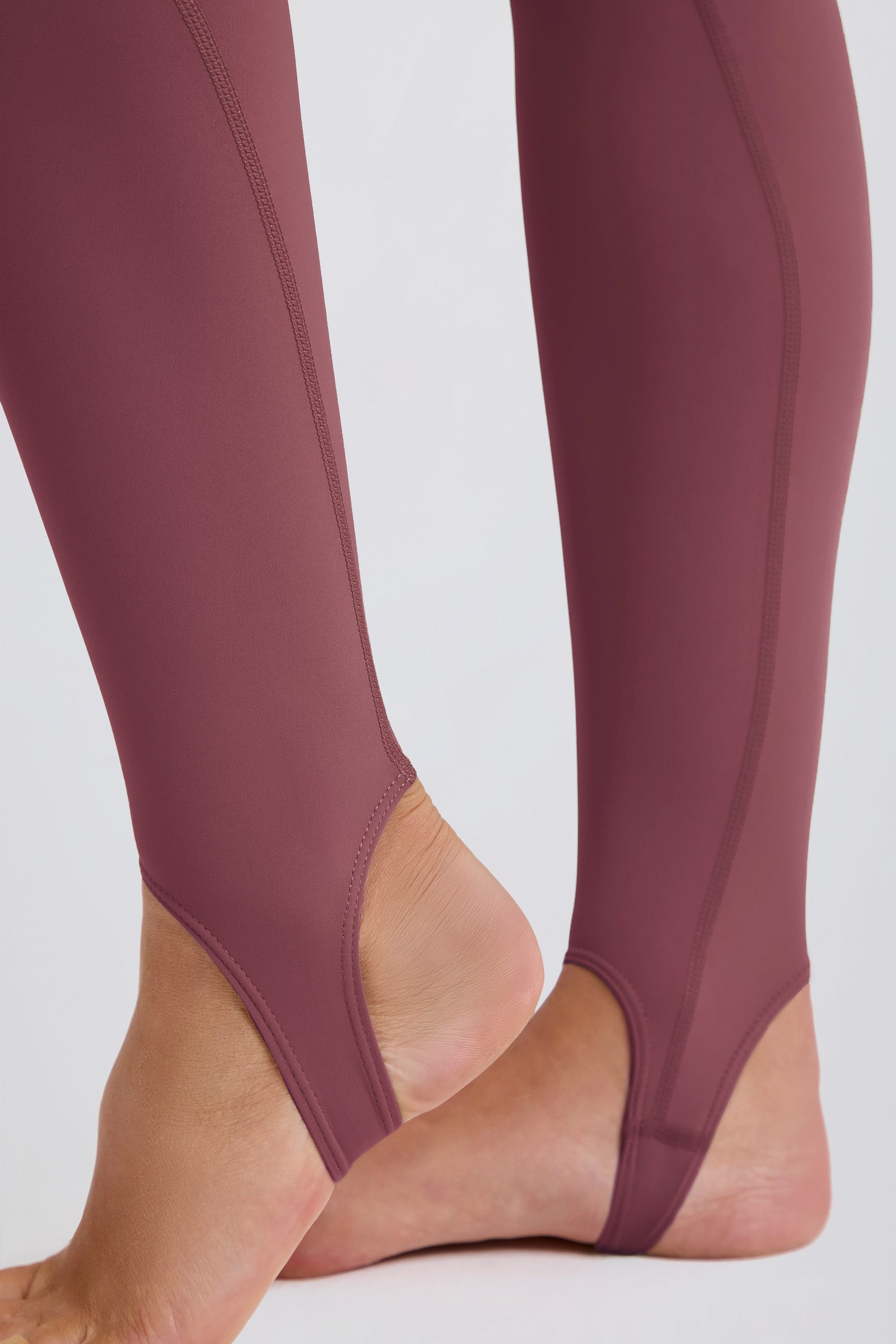 Four-Way Stretch Foldover Mid-Rise Stirrup Leggings in Acai