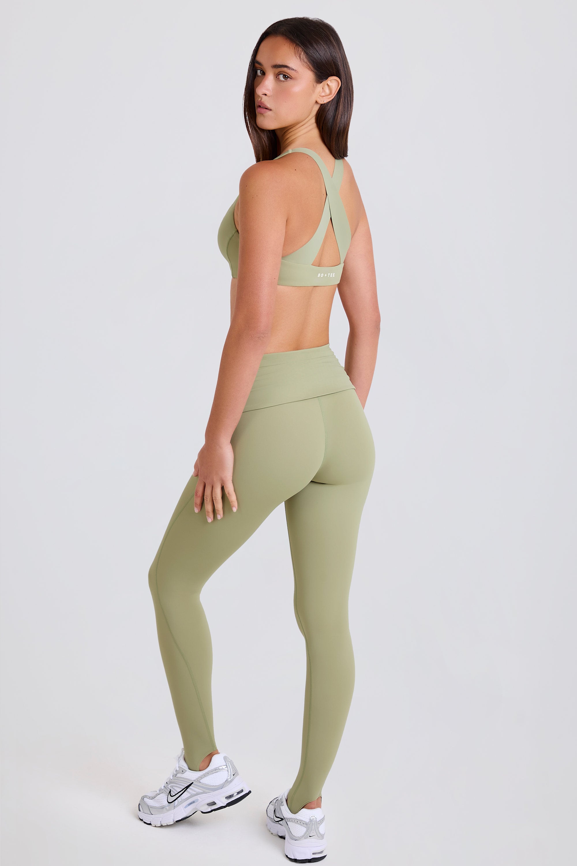 Four-Way Stretch Foldover Mid-Rise Stirrup Leggings in Matcha