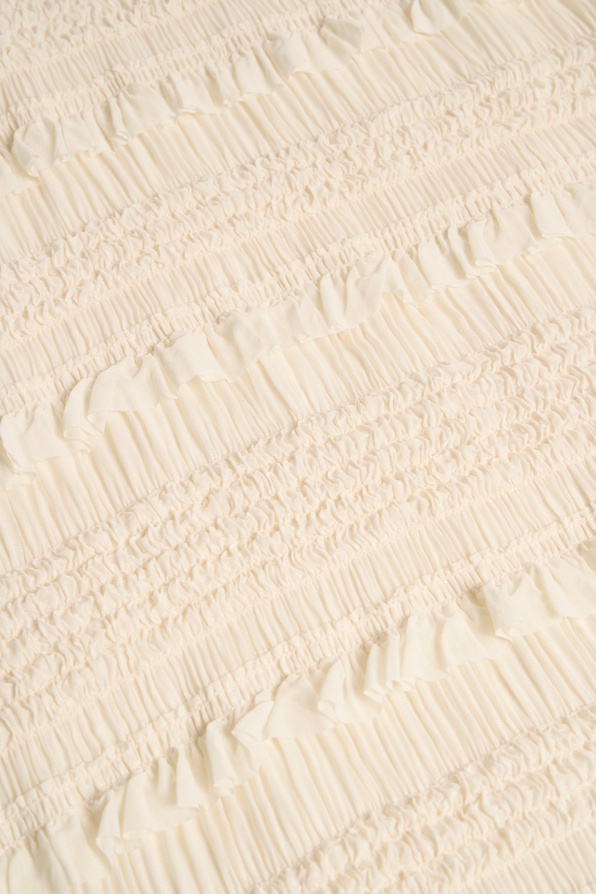 Ruffled High-Neck Backless Top in Ivory