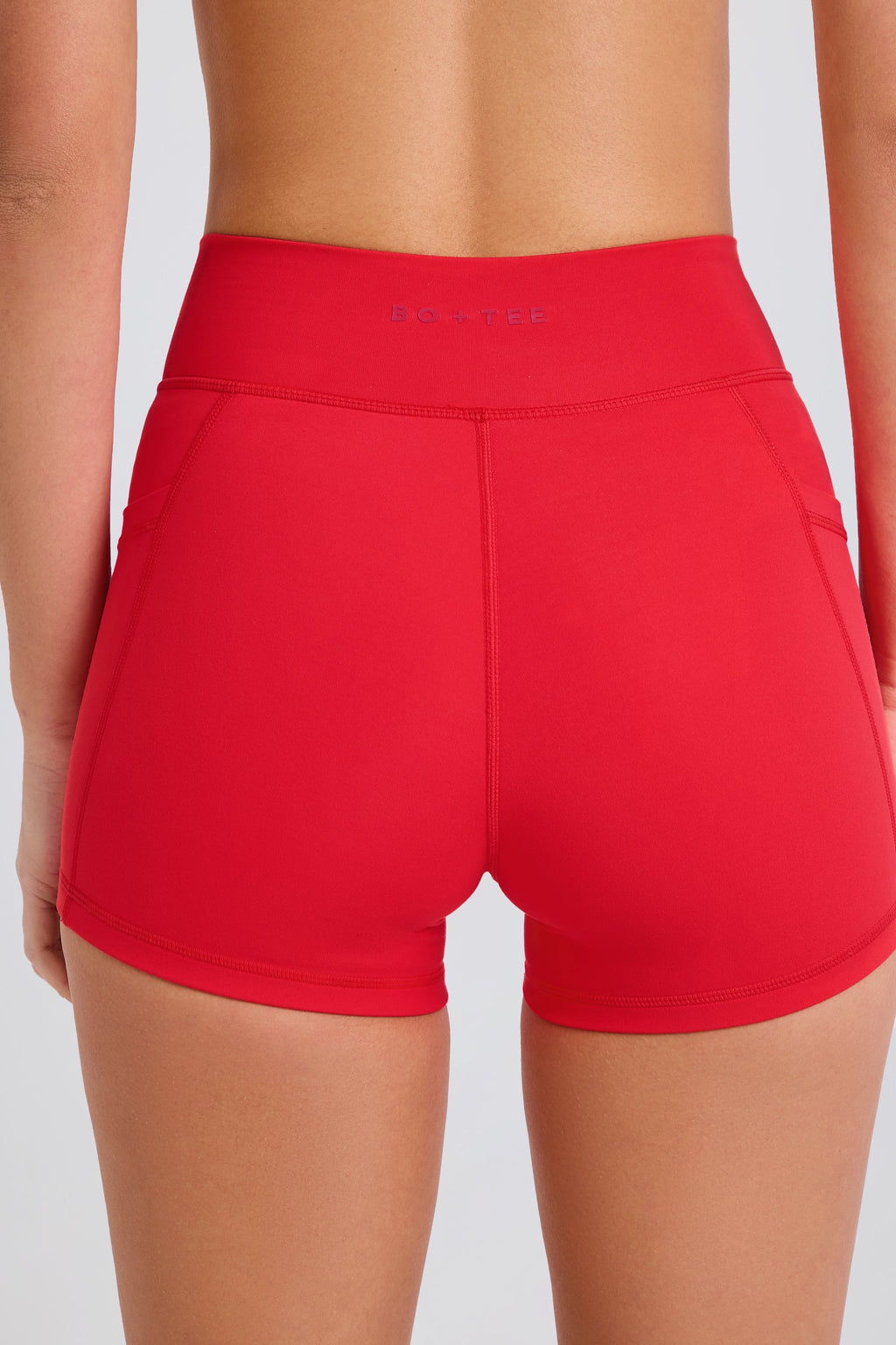 Soft Active Pocket V-Waist Mini Shorts in Strawberry Red