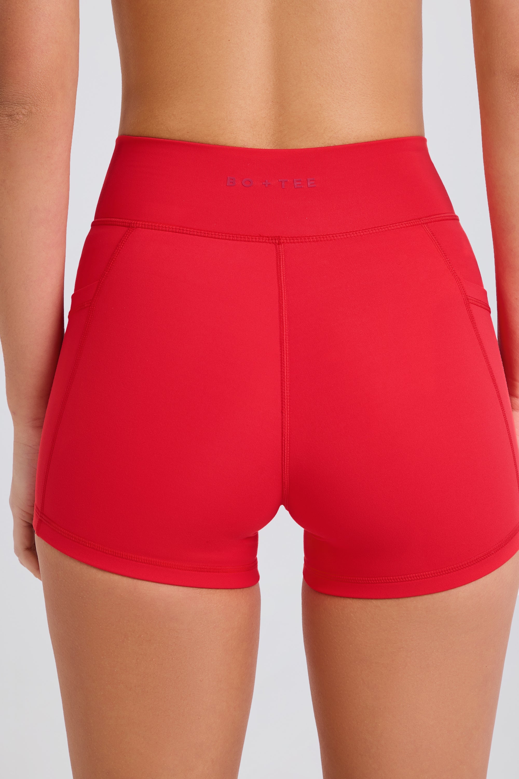 Soft Active Pocket V-Waist Mini Shorts in Strawberry Red