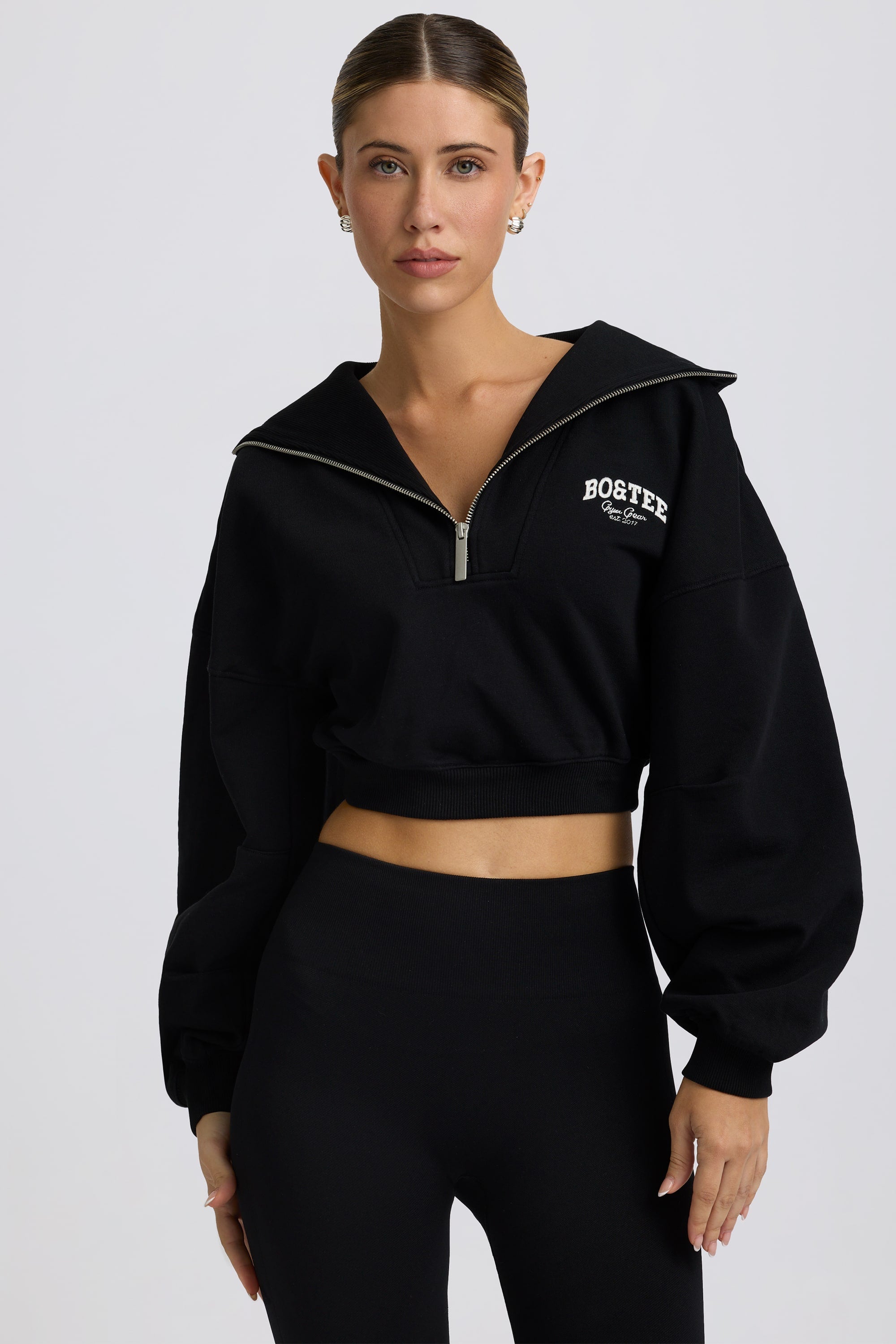 Fleece Lined Quarter-Zip Cropped Sweatshirt in Black