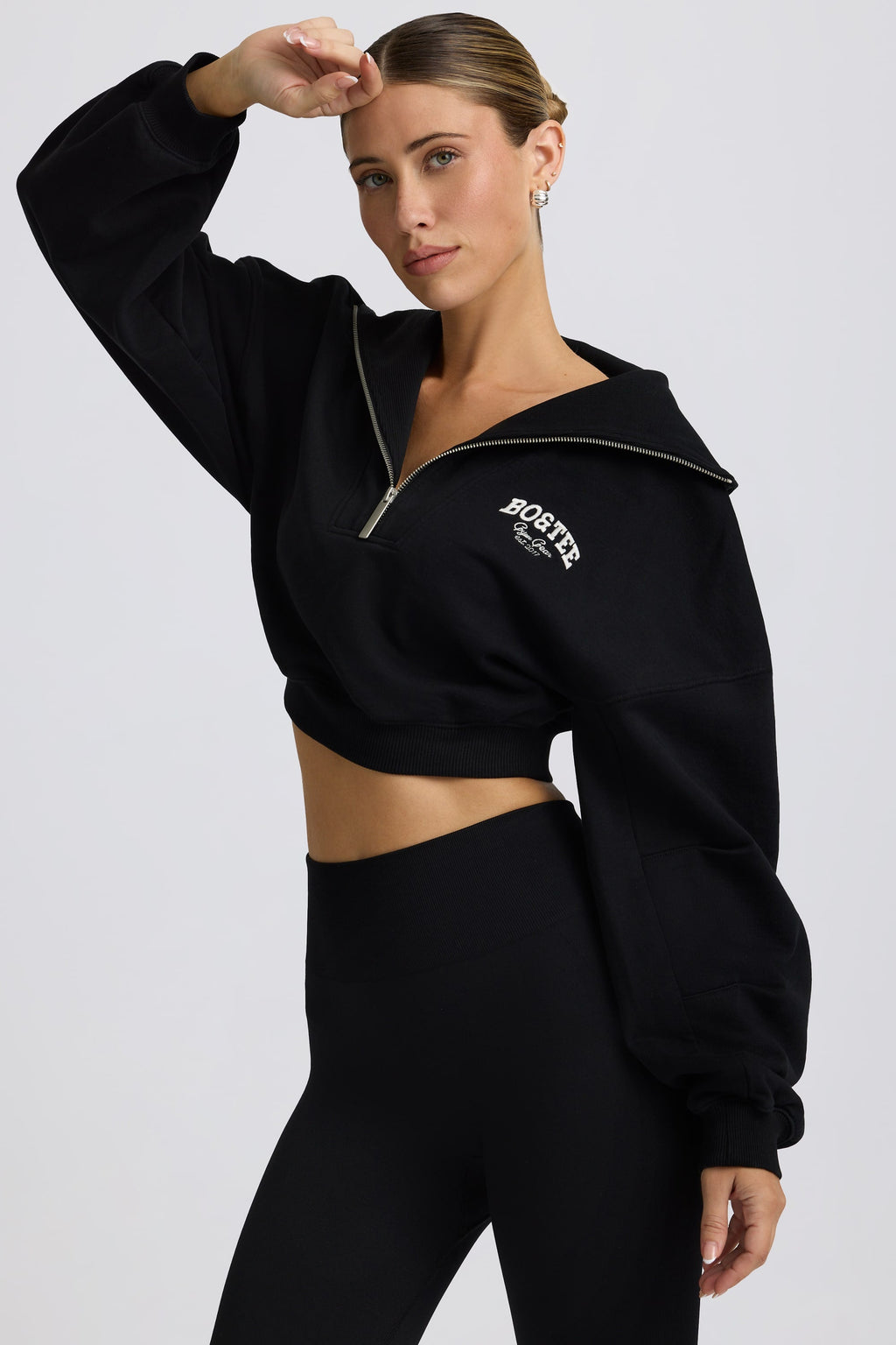 Fleece Lined Quarter-Zip Cropped Sweatshirt in Black