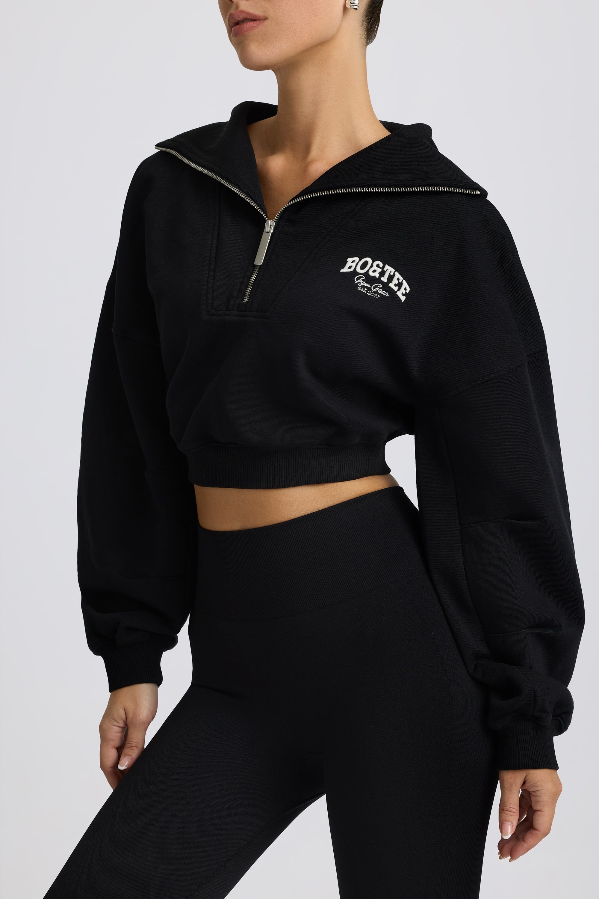 Fleece Lined Quarter-Zip Cropped Sweatshirt in Black