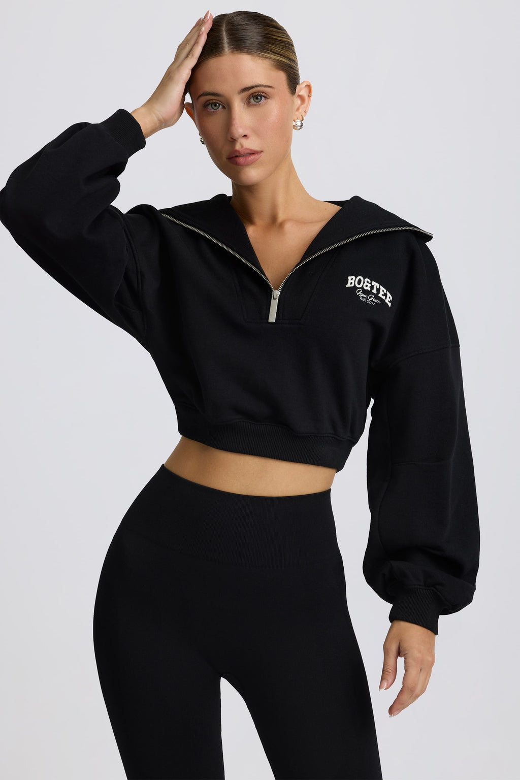 Fleece Lined Quarter-Zip Cropped Sweatshirt in Black