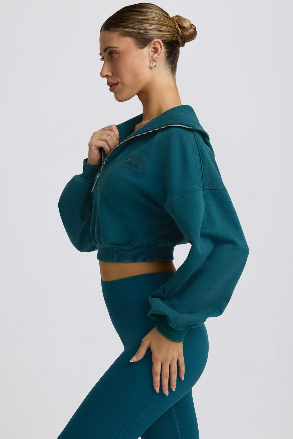 Fleece Lined Quarter-Zip Cropped Sweatshirt in Teal