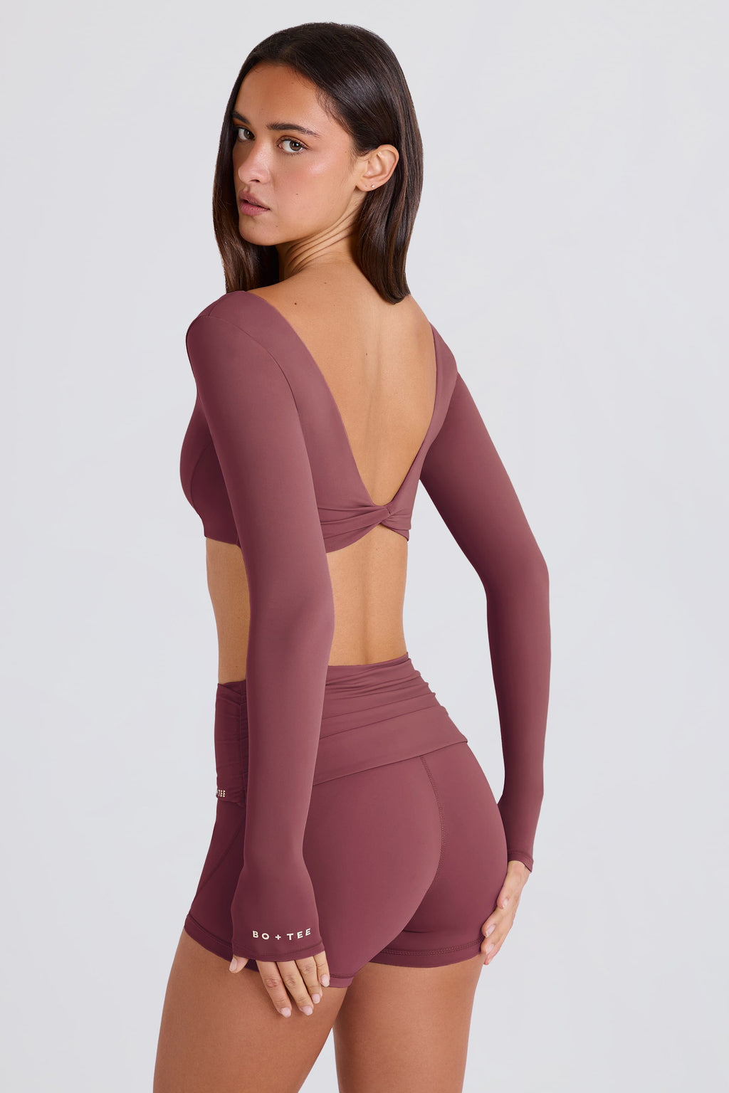 Four-Way Stretch Multiway Long-Sleeve Crop Top in Acai