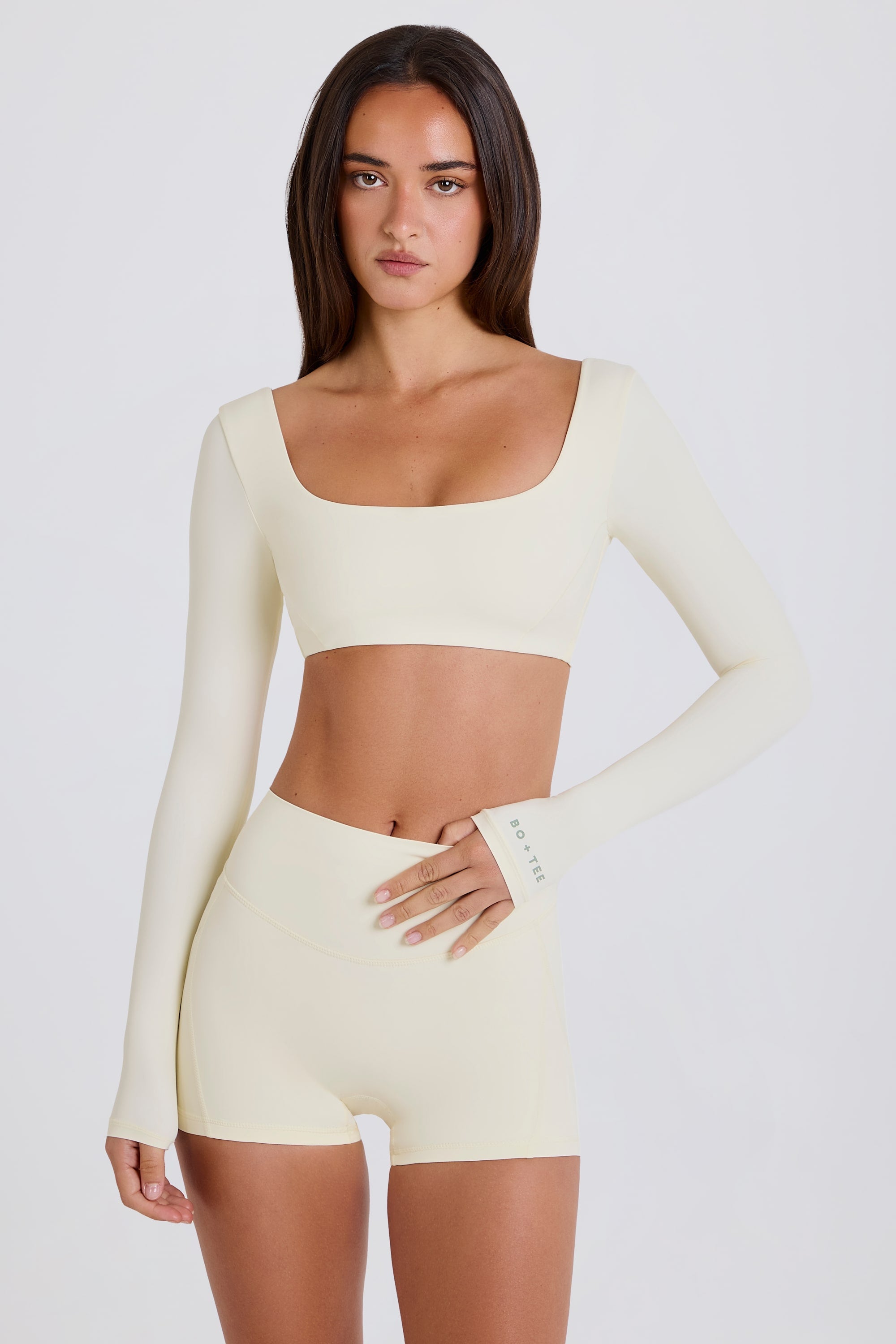 Four-Way Stretch Multiway Long-Sleeve Crop Top in Cream