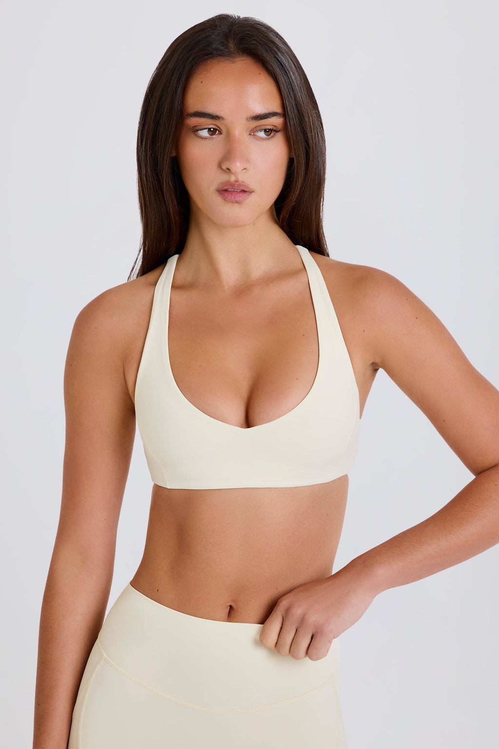 Four-Way Stretch Crossback V-Neck Sports Bra in Cream