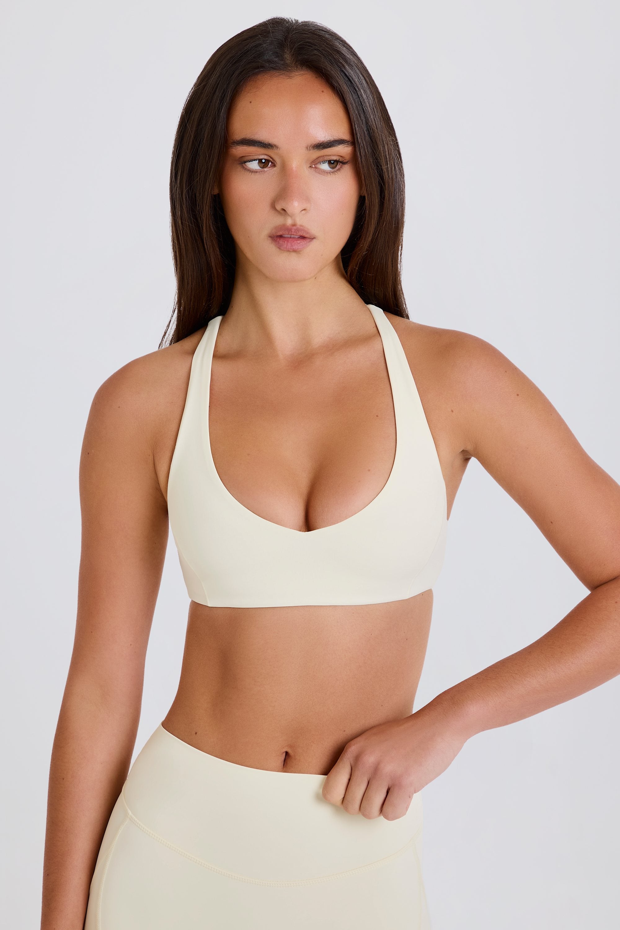 Four-Way Stretch Crossback V-Neck Sports Bra in Cream